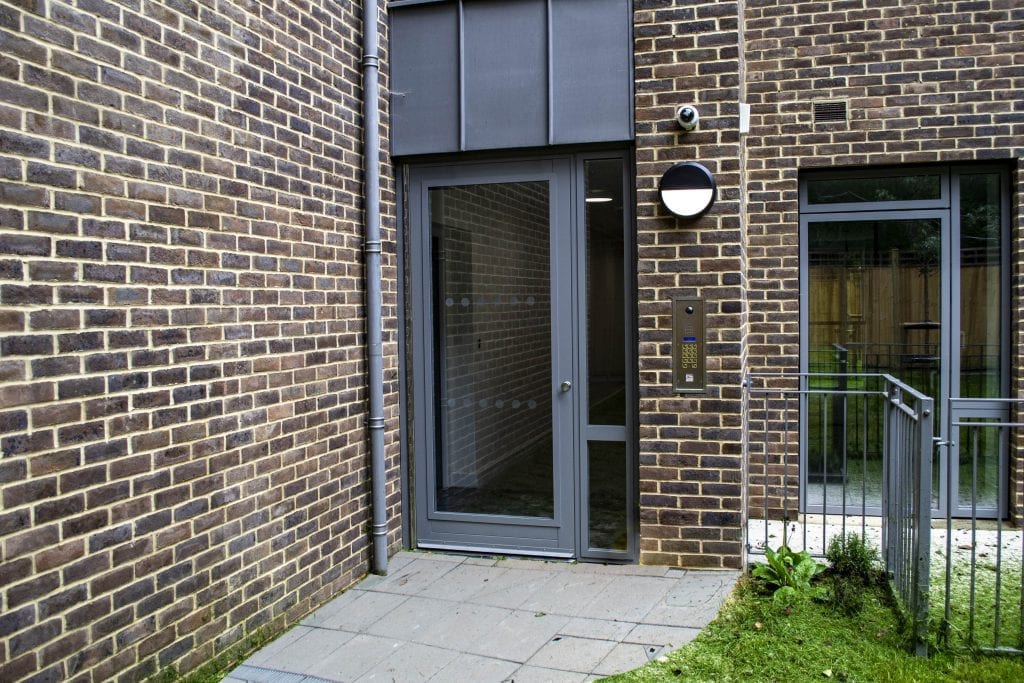 Fully Glazed Warrior Communal Entrance Door & Screen on a Communal Residential Building
