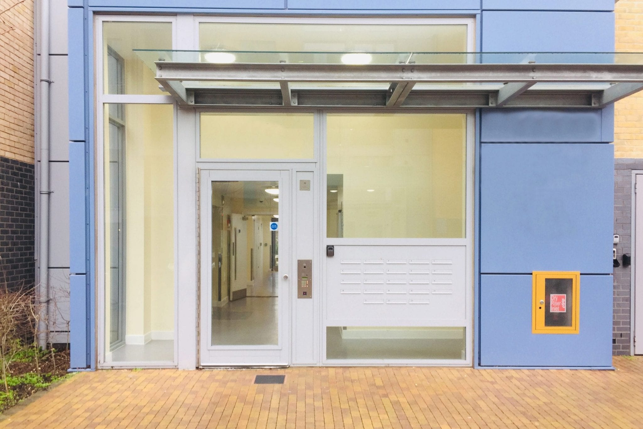 Fully Glazed Warrior Communal Entrance Door & Screens on a Communal Residential Building
