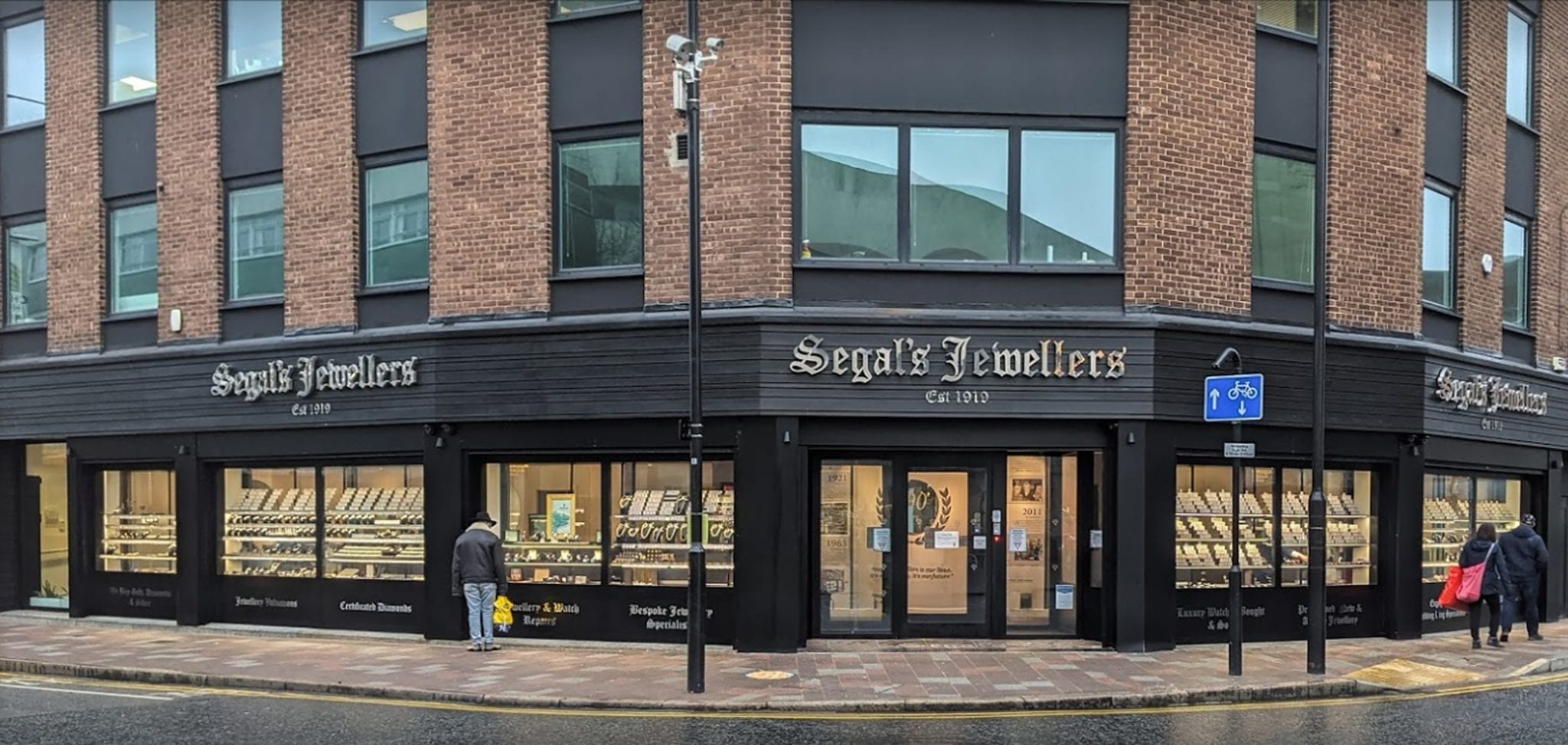Long Jewellery store shopfront with Warrior Sliding Interlock and Displays. Large sign reading "Segals Jewellers".
