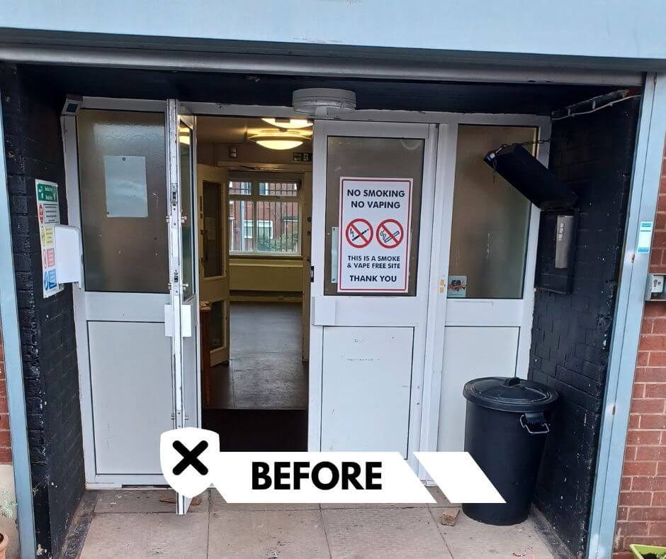 Before — uPVC communal entrance with narrow opening and frosted glazing at Auckland Hall, Solihull.